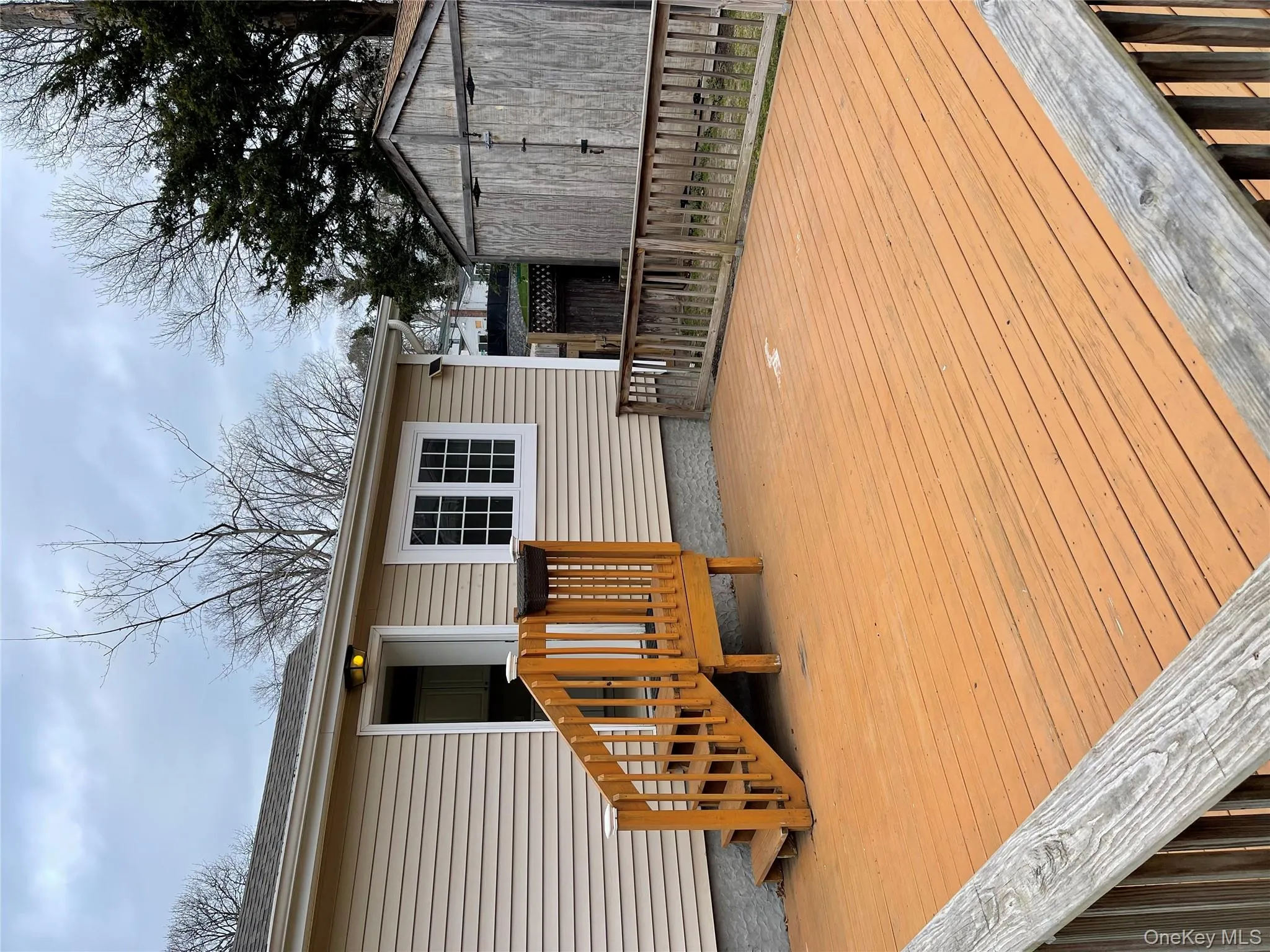 Deck featuring a storage shed Deck featuring a storage shed