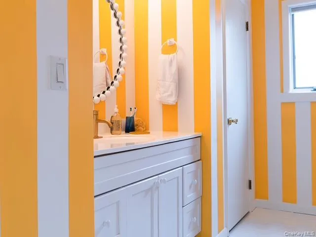 Bathroom featuring vanity Bathroom featuring vanity