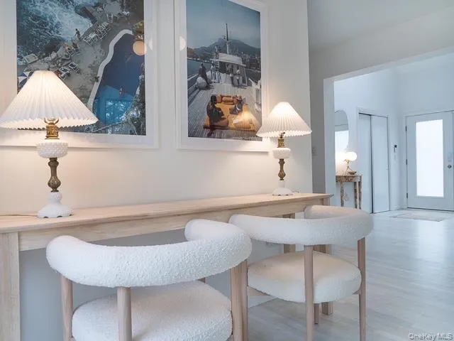 Dining space featuring wood finished floors Dining space featuring wood finished floors