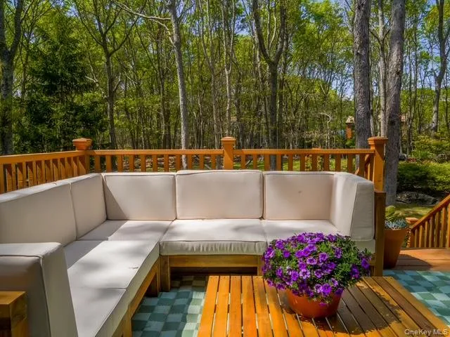 Wooden deck featuring an outdoor living space Wooden deck featuring an outdoor living space