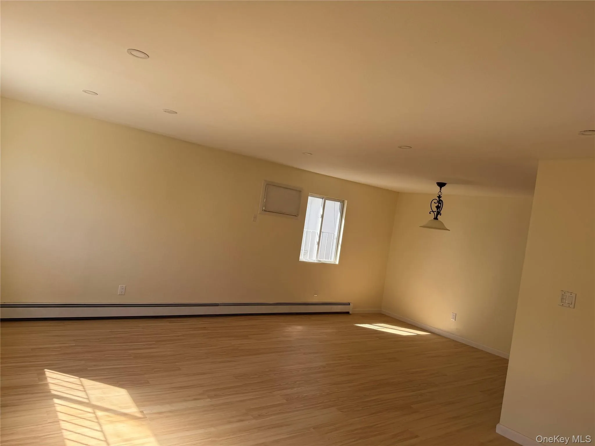 Spare room featuring light wood-style floors and recessed lighting Spare room featuring light wood-style floors and recessed lighting