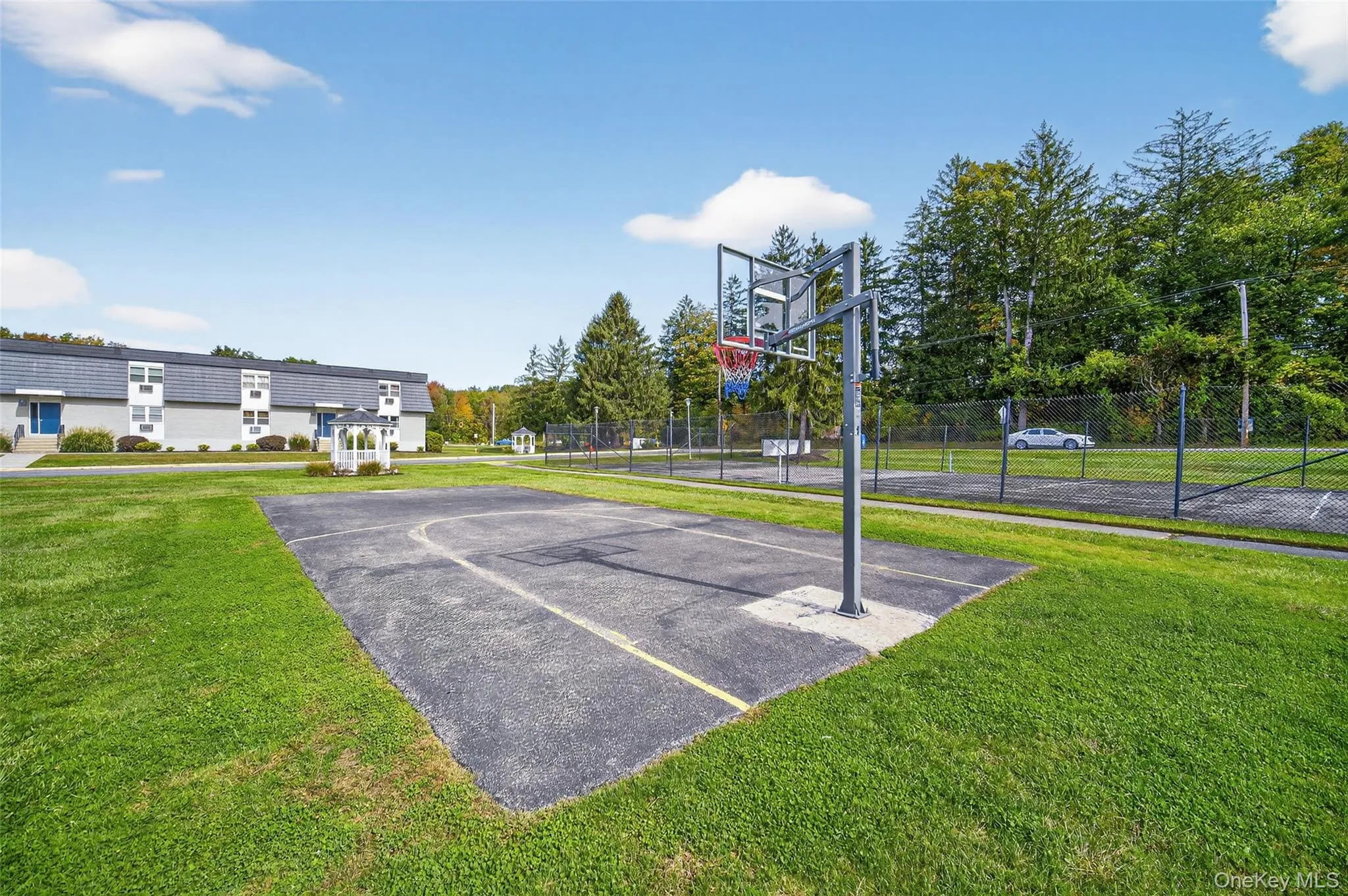 View of sport court featuring community basketball court View of sport court featuring community basketball court