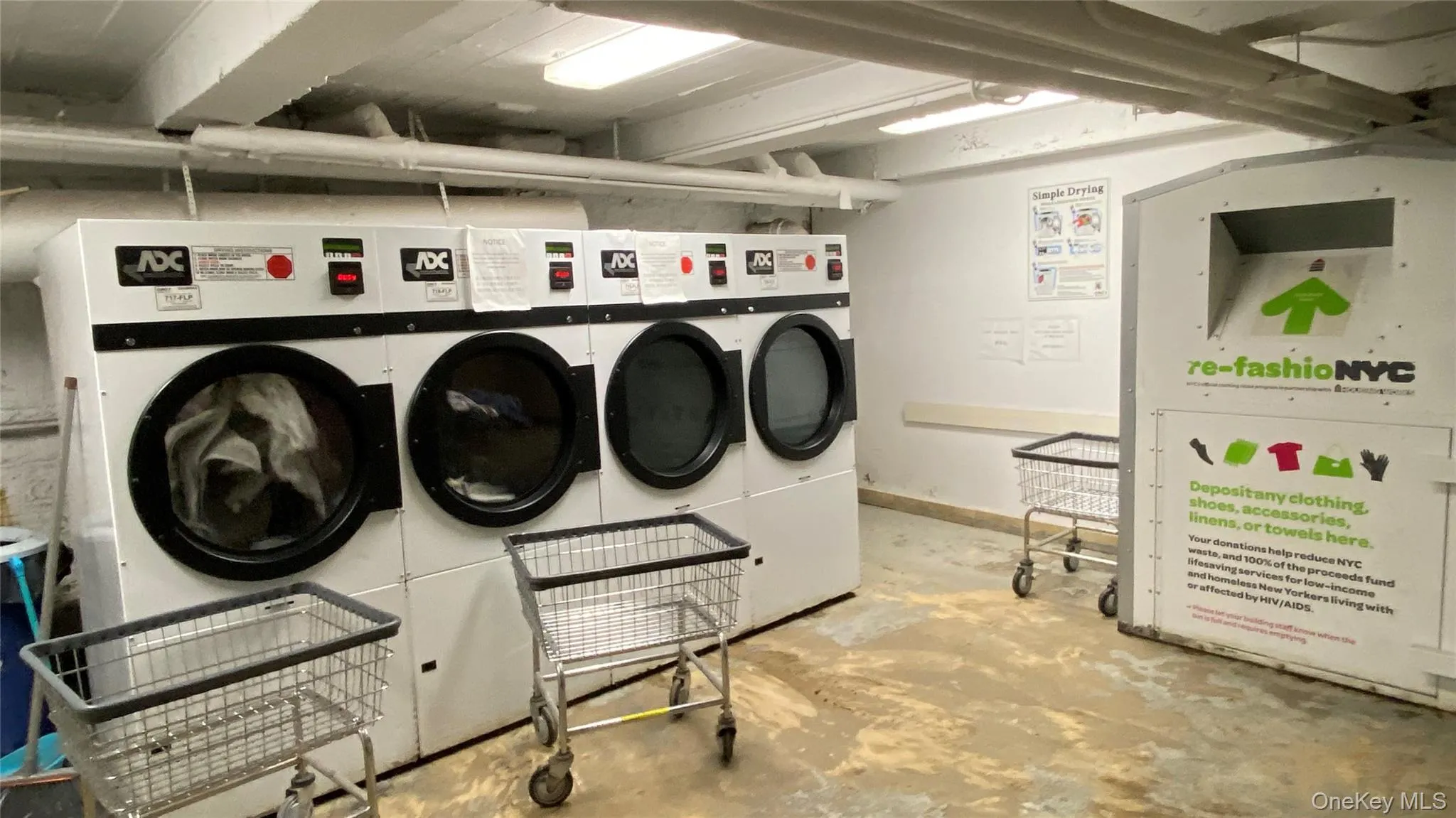 Shared laundry room with washer and dryer Shared laundry room with washer and dryer