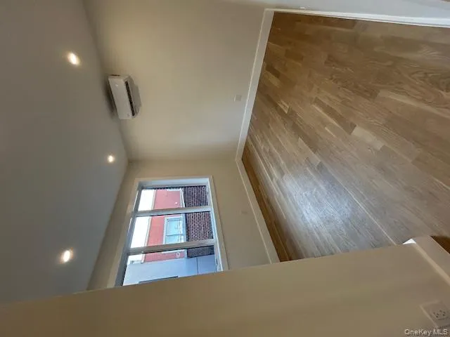 Empty room with recessed lighting and light wood-style floors Empty room with recessed lighting and light wood-style floors