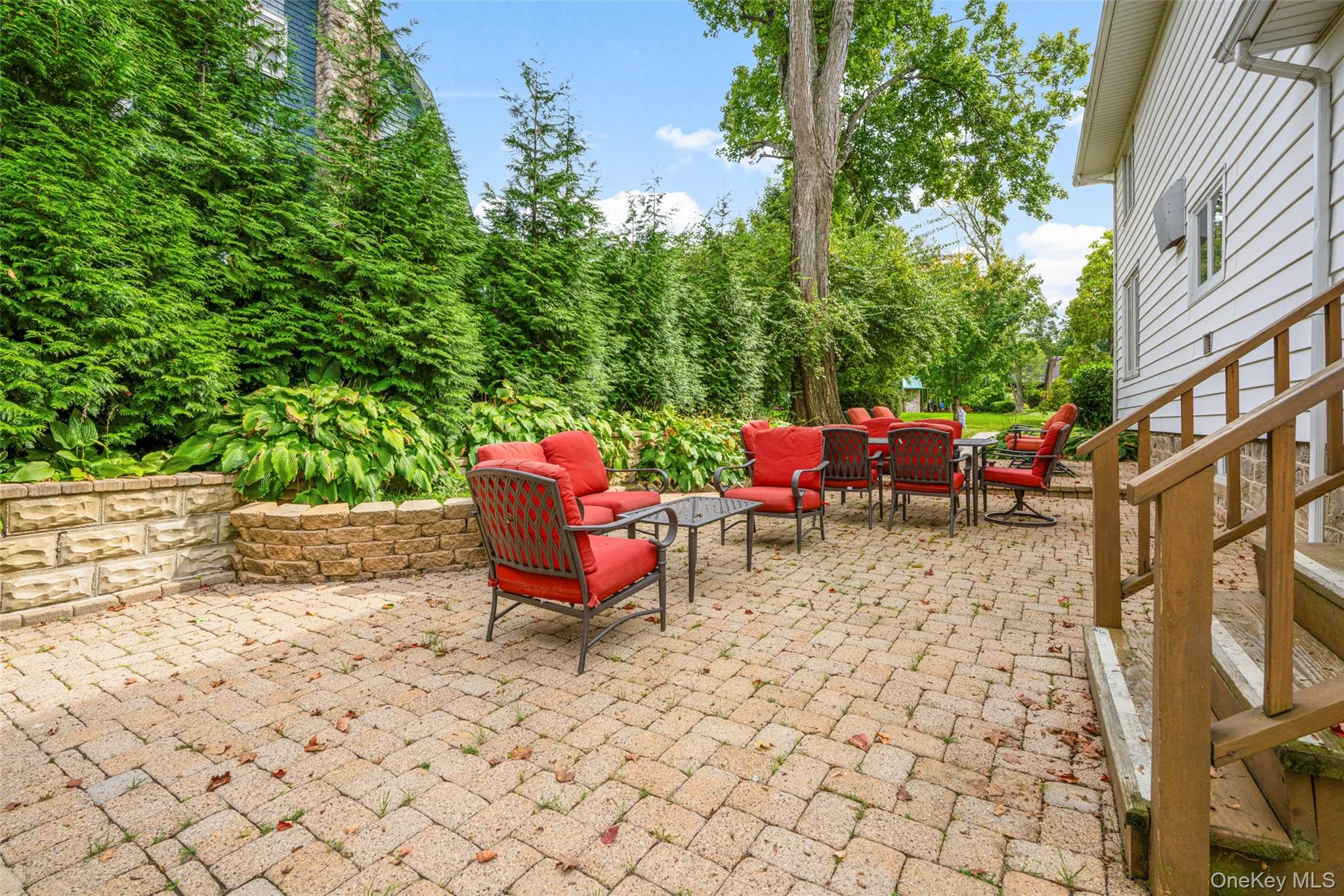 View of patio with outdoor dining area and outdoor lounge area View of patio with outdoor dining area and outdoor lounge area