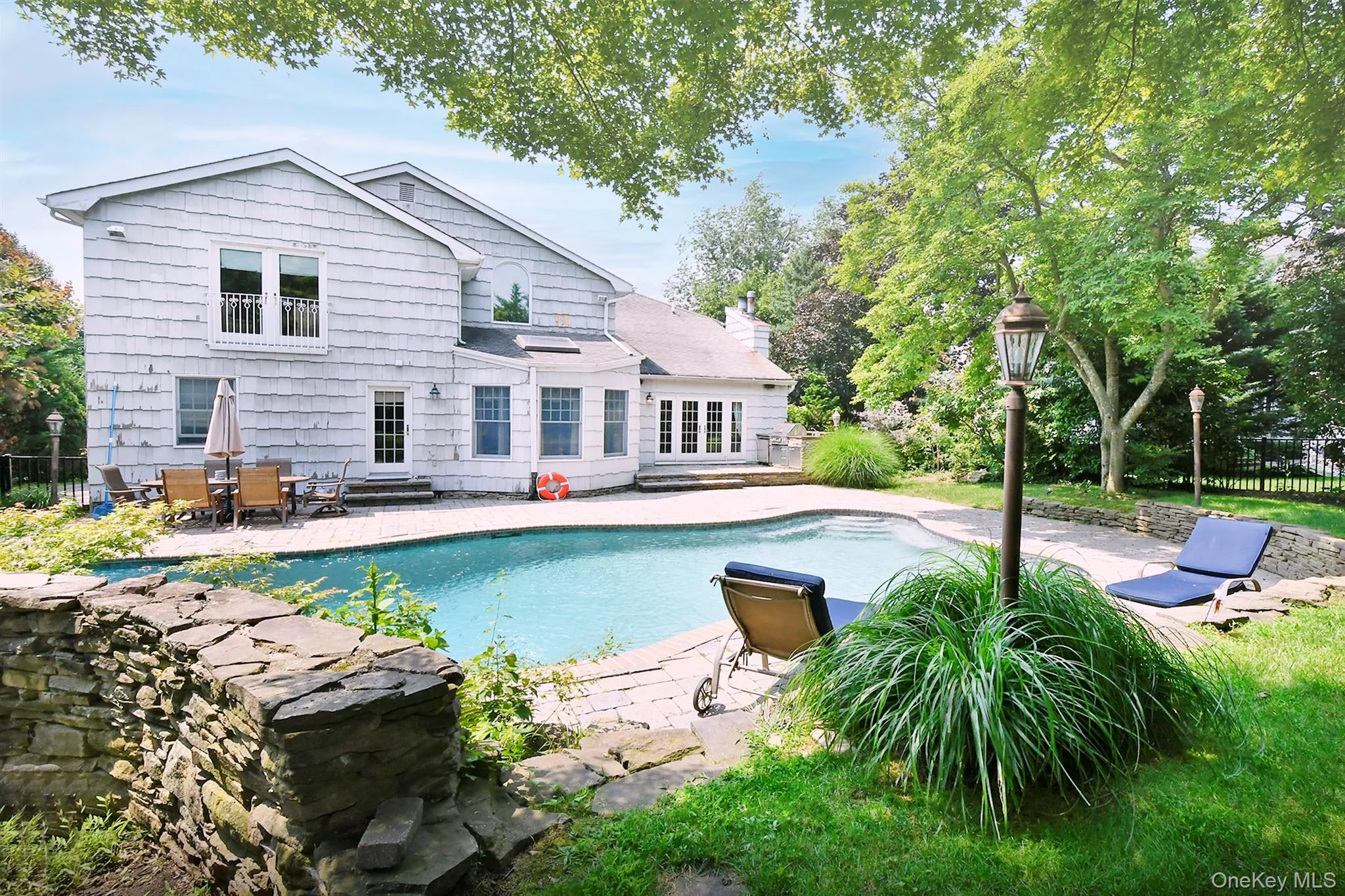 View of swimming pool featuring a patio View of swimming pool featuring a patio