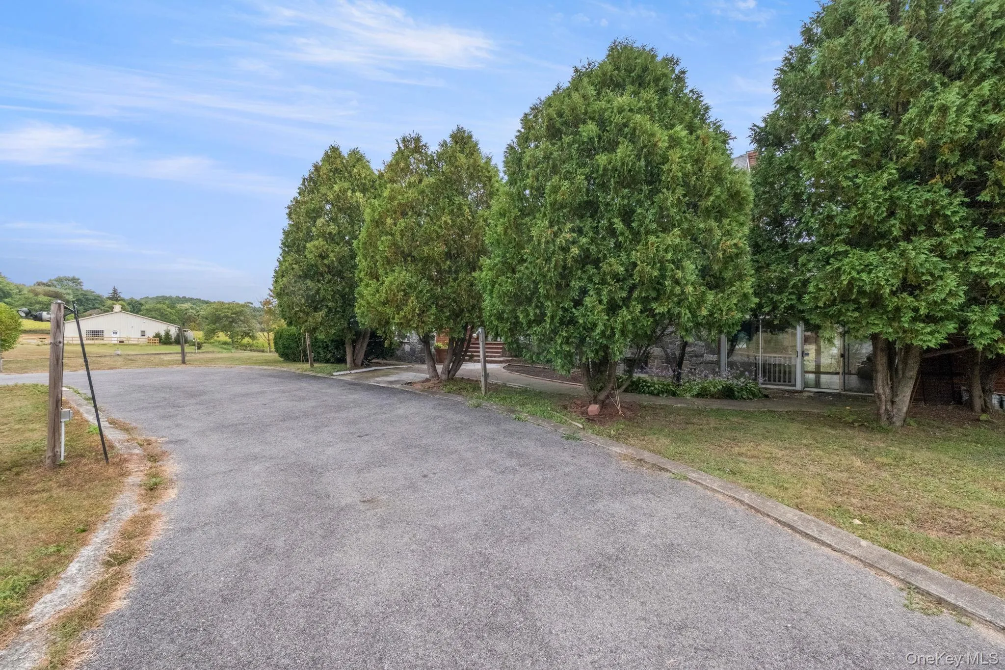 View of asphalt driveway View of asphalt driveway