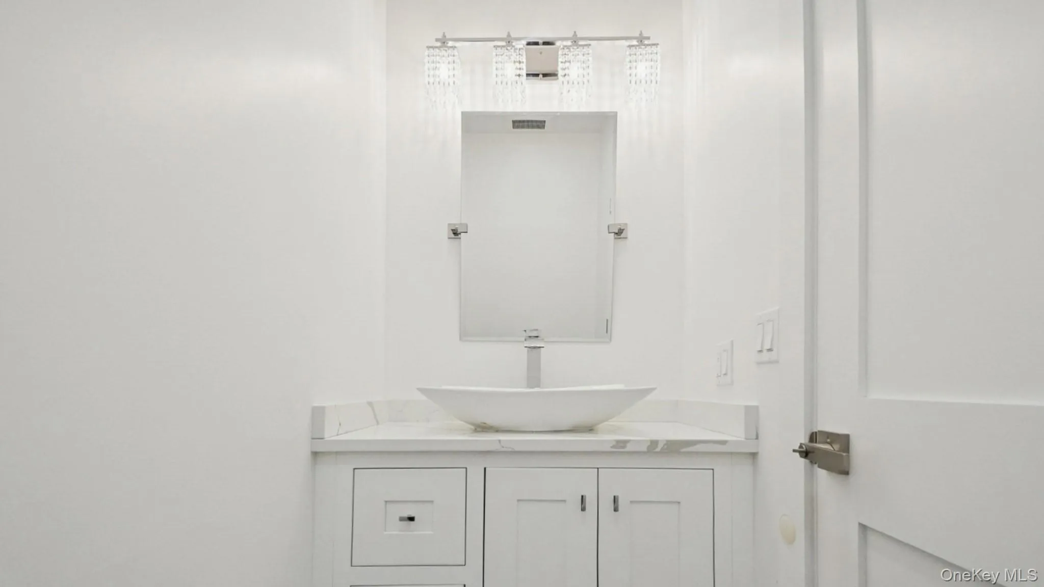 Bathroom featuring vanity Bathroom featuring vanity