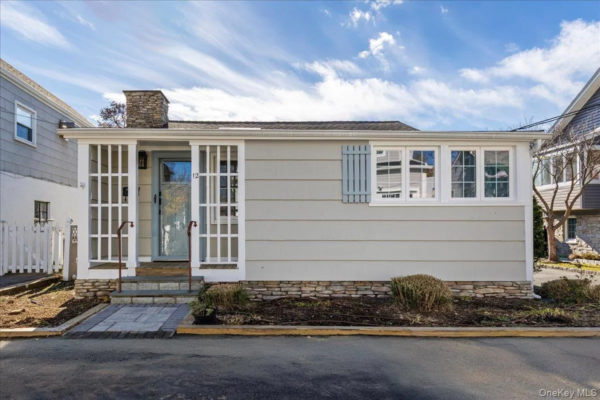 View of front of property featuring a chimney View of front of property featuring a chimney
