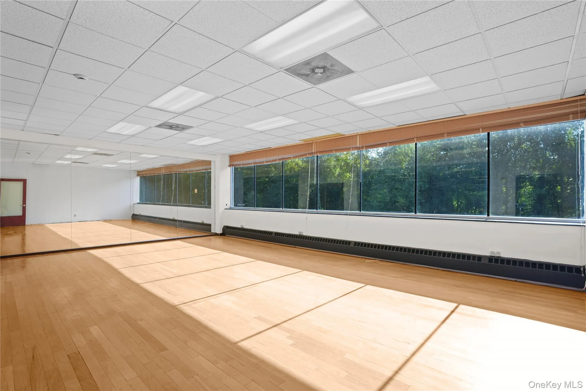 Built out space with mirrored wall Built out space with mirrored wall