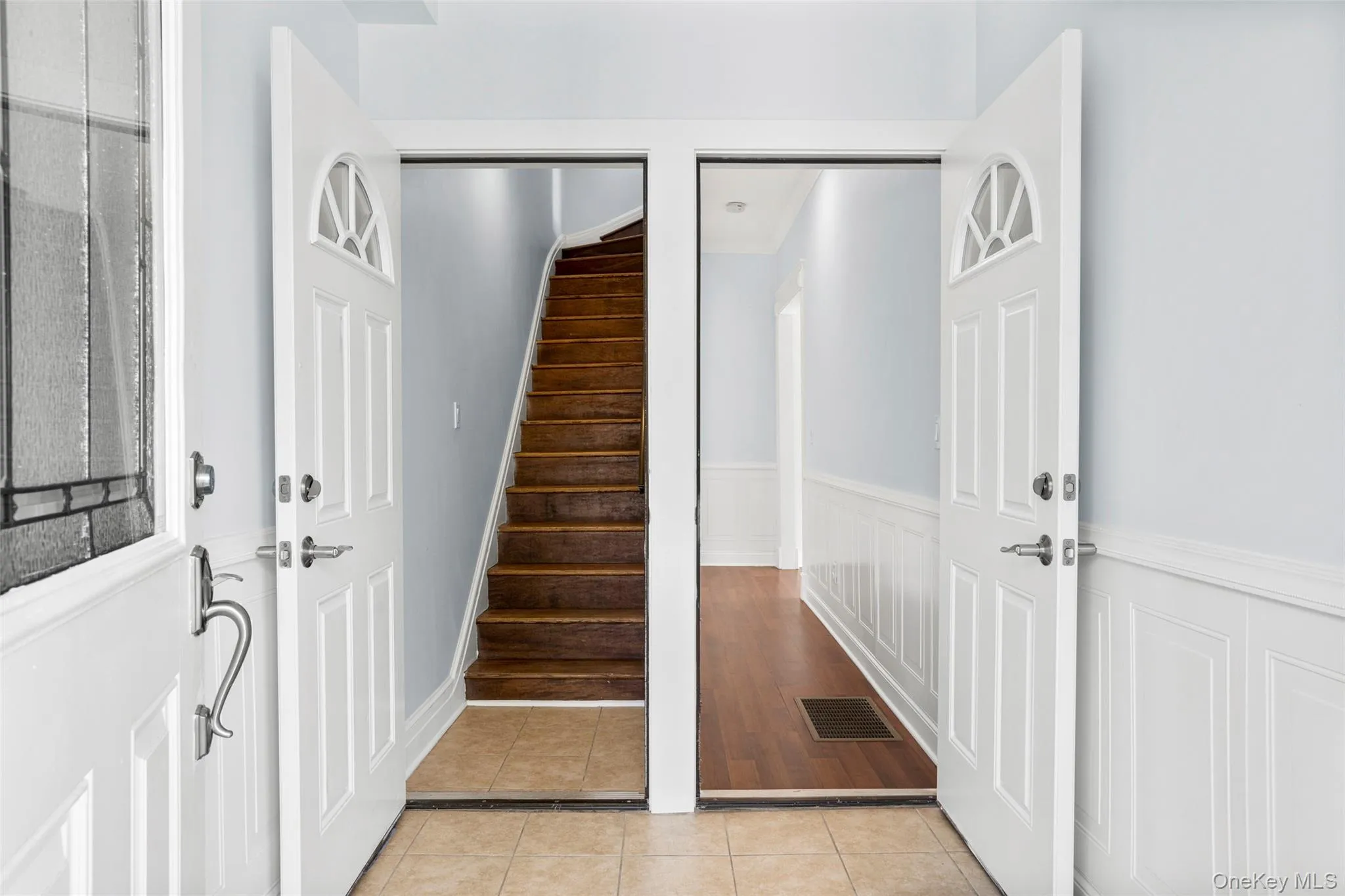Shared entry- stairs to second floor apartment Shared entry- stairs to second floor apartment