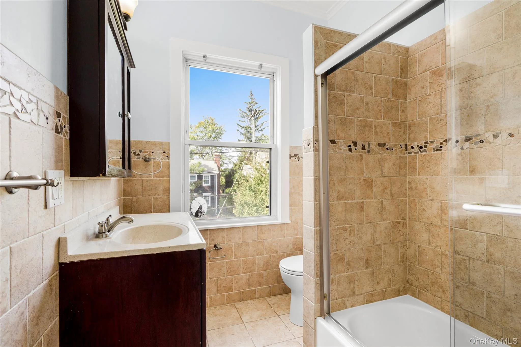 Full bath with glass enclosed shower Full bath with glass enclosed shower