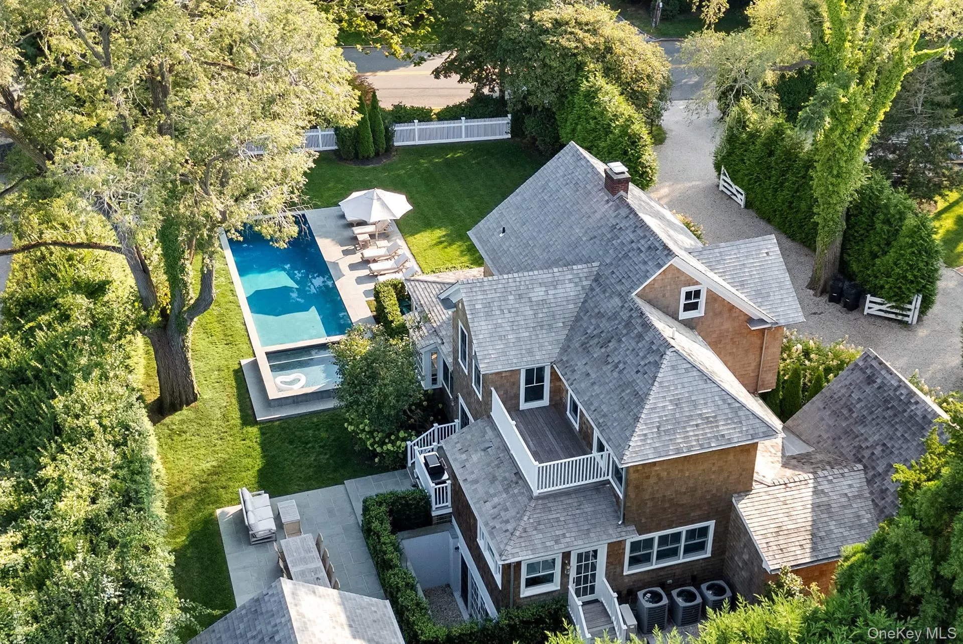 View of subject property with a pool View of subject property with a pool