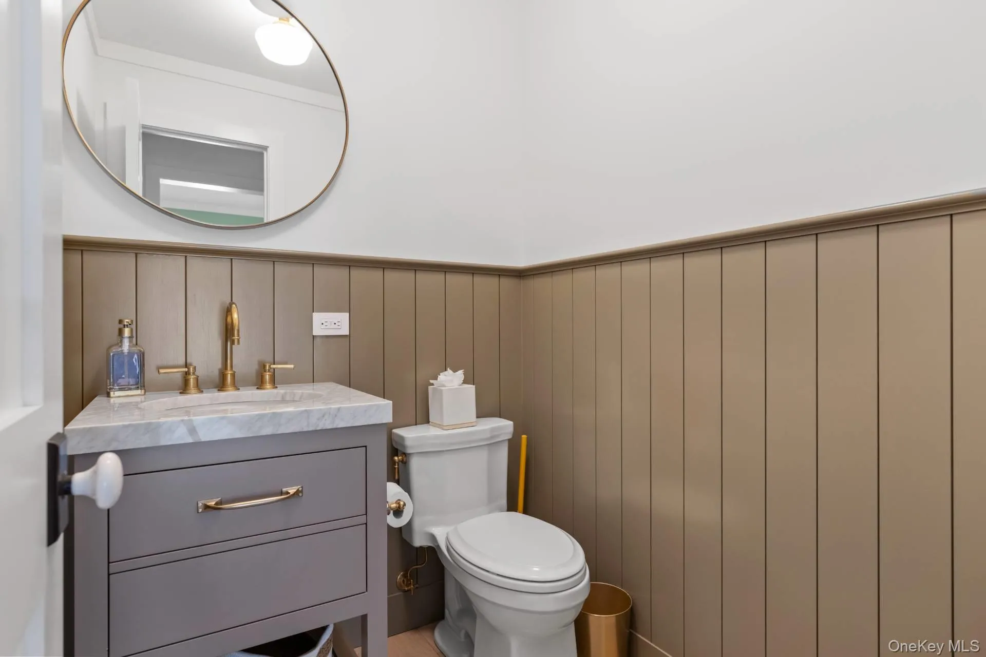 Bathroom with vanity and wainscoting Bathroom with vanity and wainscoting