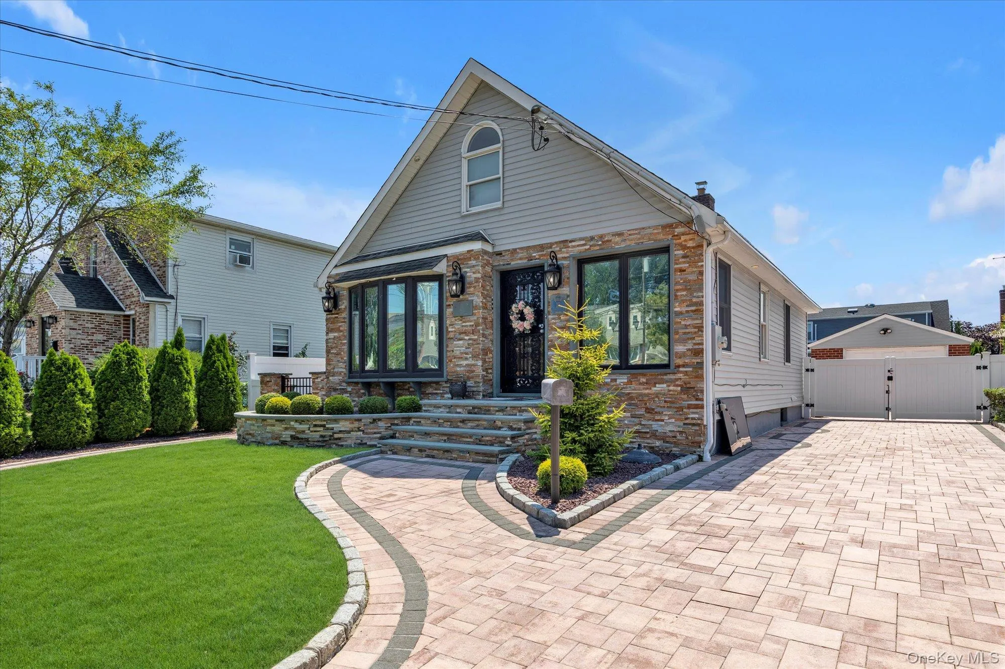 View of front of house with a gate and a chimney View of front of house with a gate and a chimney