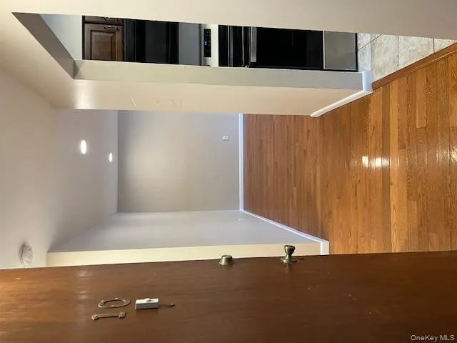 Hallway featuring light wood-style floors and recessed lighting Hallway featuring light wood-style floors and recessed lighting