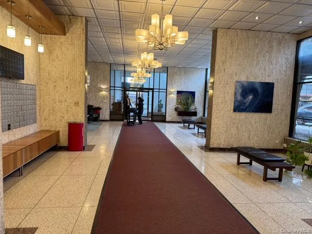 Common area with wallpapered walls Common area with wallpapered walls