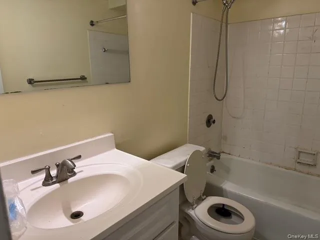 Full bath with shower / bath combination and vanity Full bath with shower / bath combination and vanity