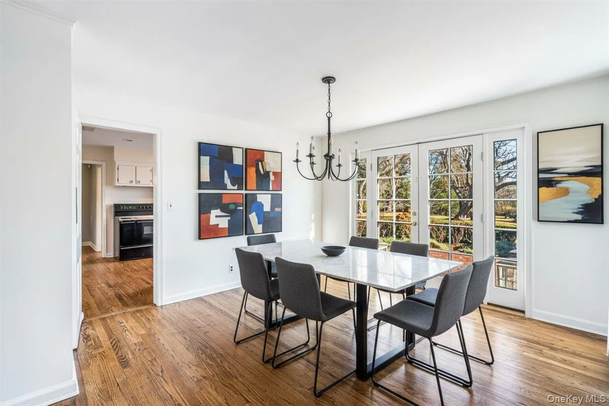 Dining Room opens to Kitchen and Patio Dining Room opens to Kitchen and Patio