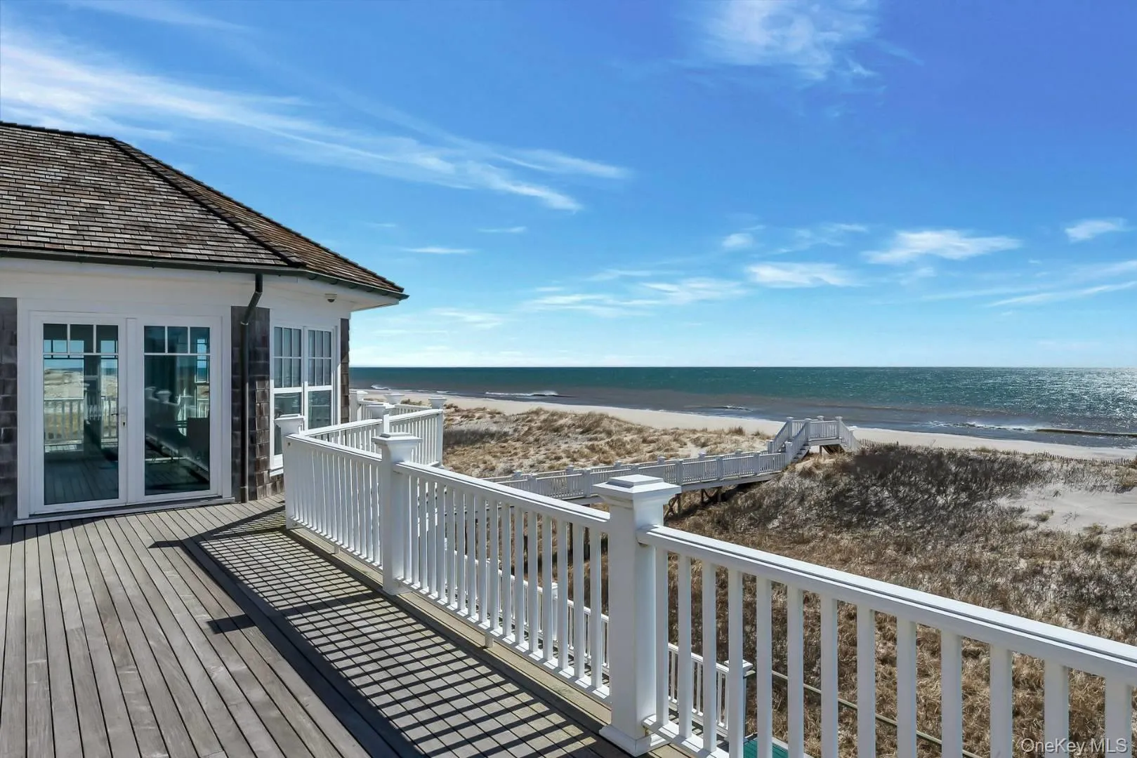 Deck featuring view of the ocean and beach Deck featuring view of the ocean and beach