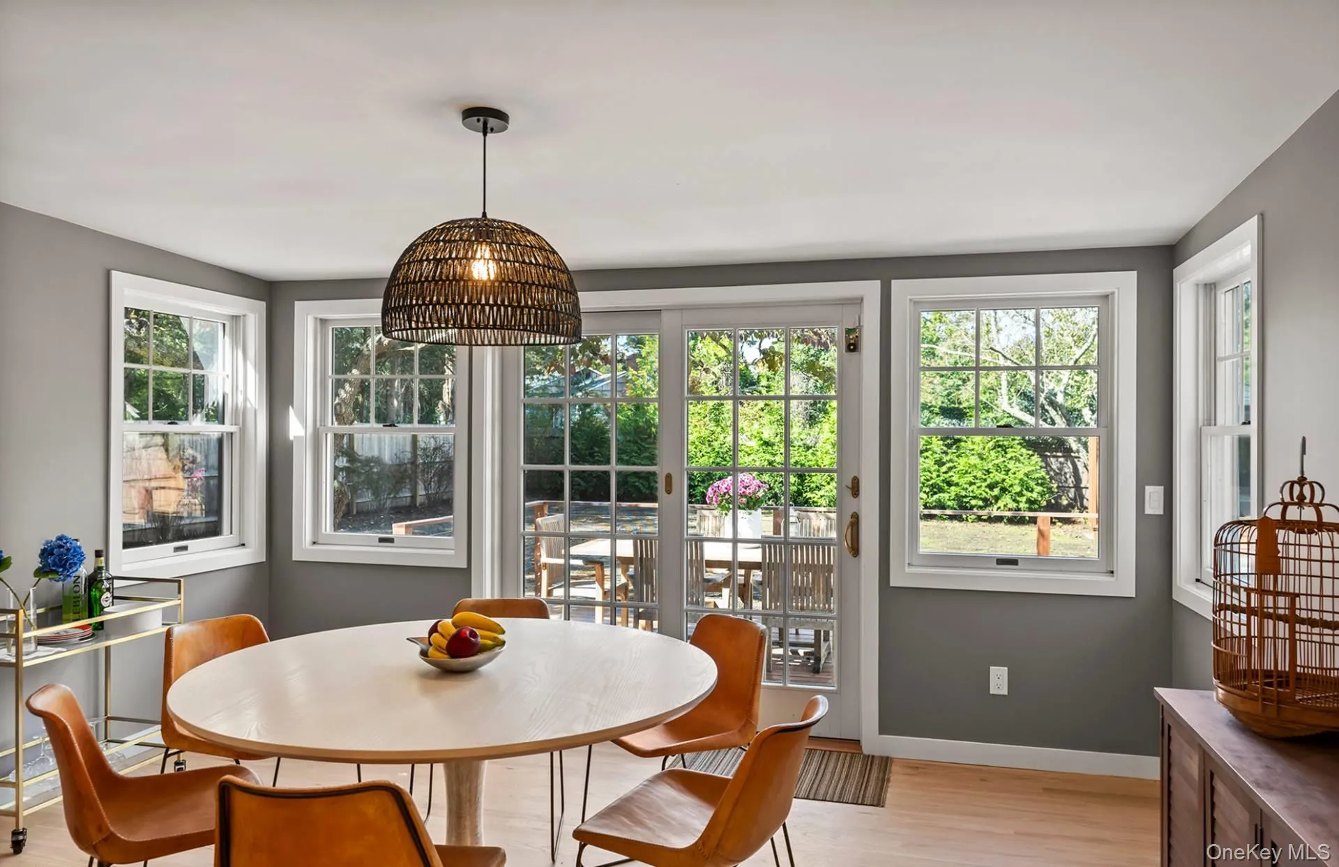 Dining space with light wood finished floors and baseboards Dining space with light wood finished floors and baseboards