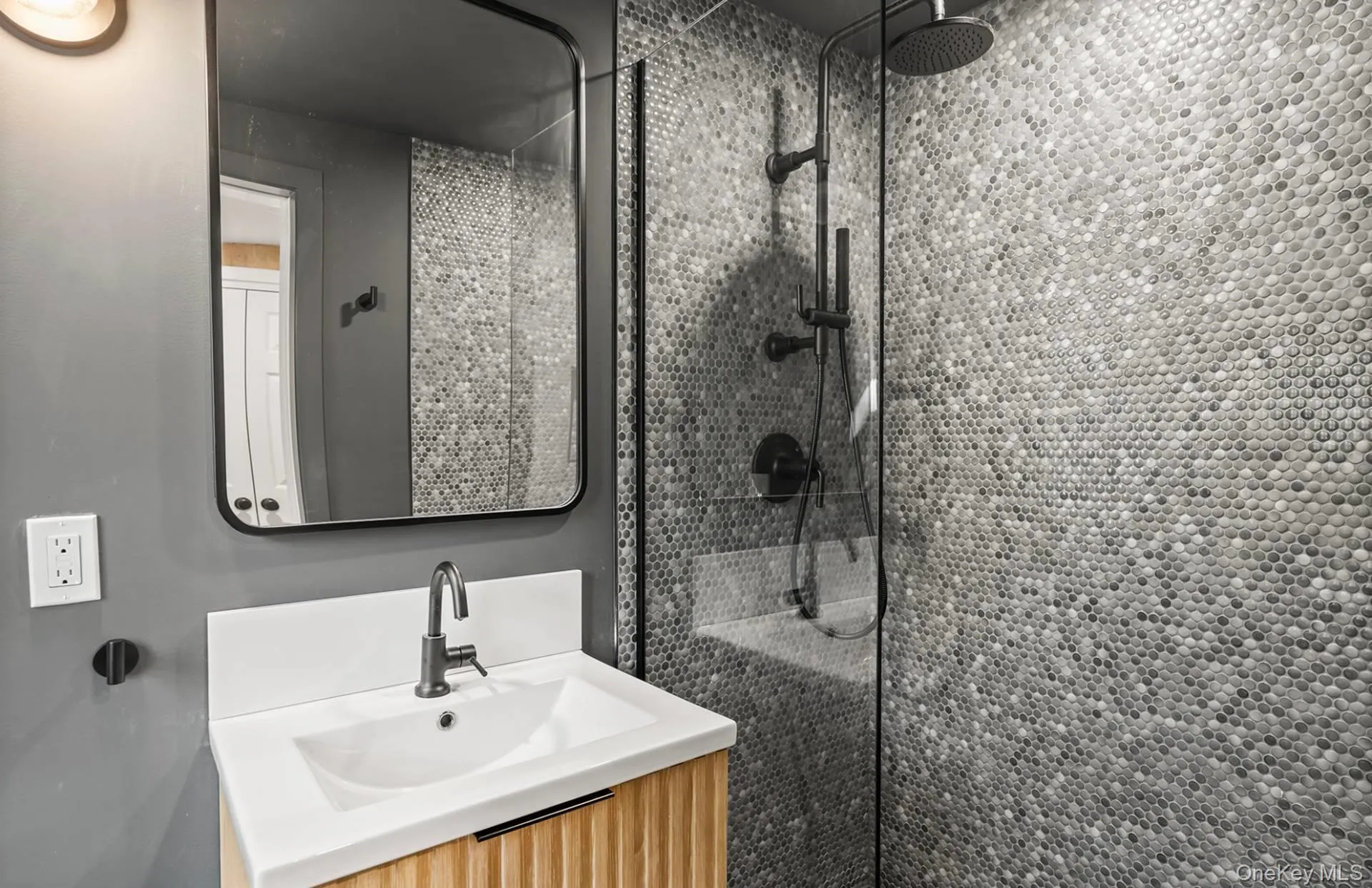 Full bath featuring vanity and a walk in shower Full bath featuring vanity and a walk in shower