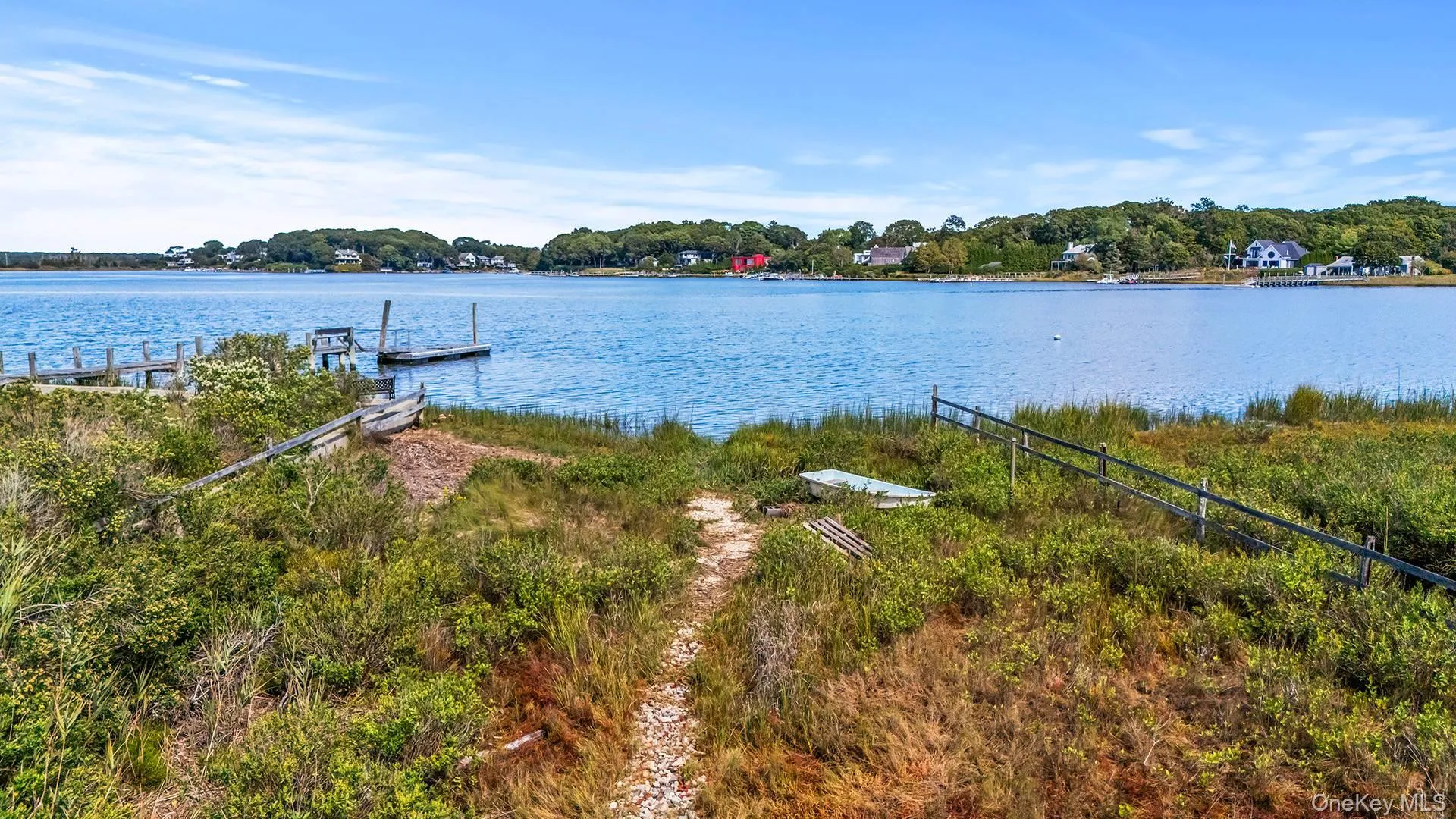 Water view featuring a floating dock Water view featuring a floating dock