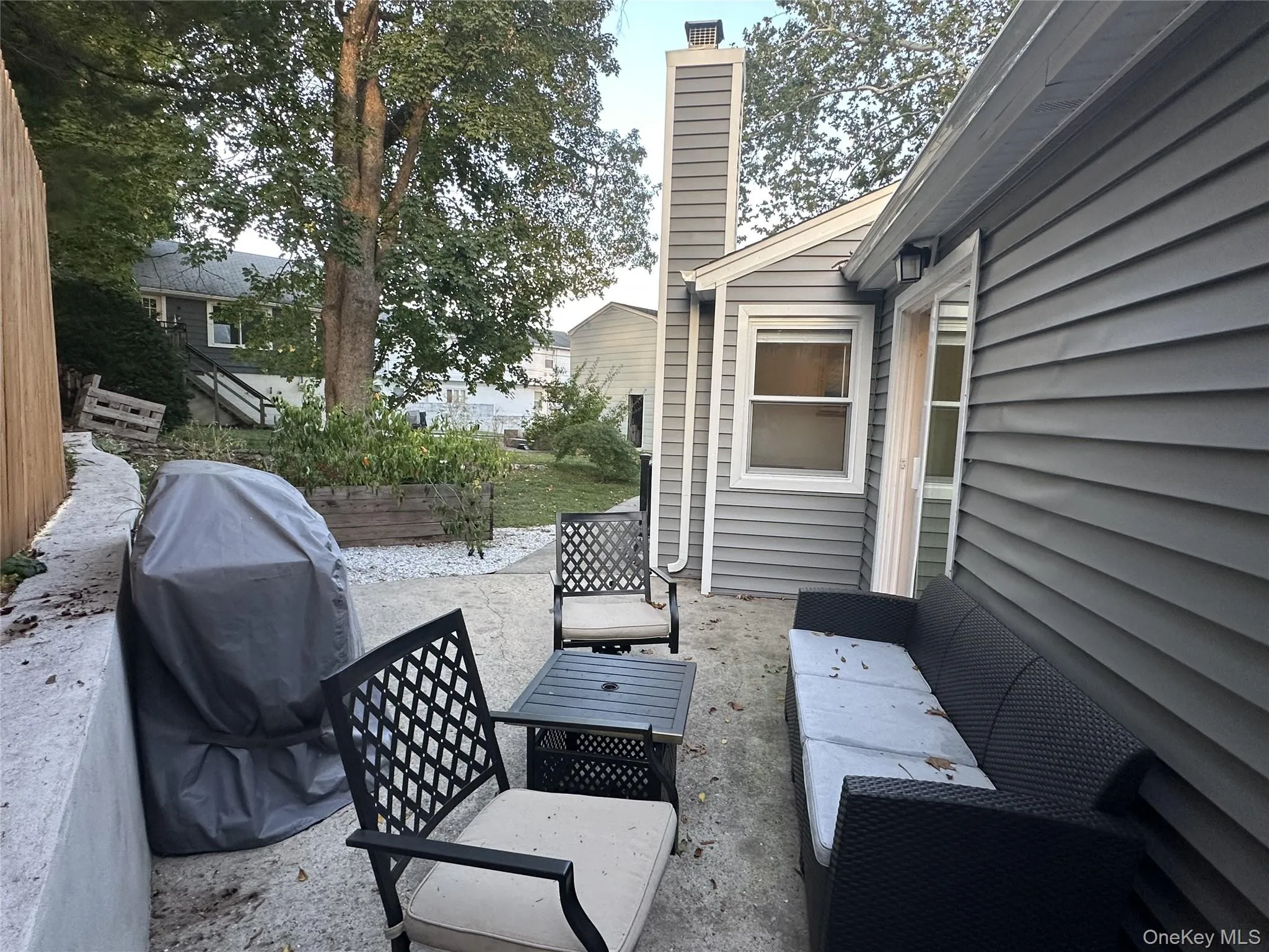 View of patio with a grill View of patio with a grill