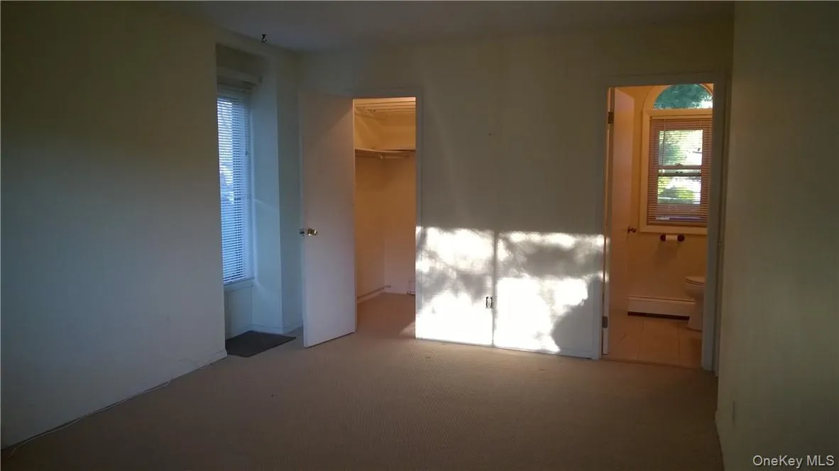 Primary Bedroom with En Suite Bathroom and Walk In Closet Primary Bedroom with En Suite Bathroom and Walk In Closet