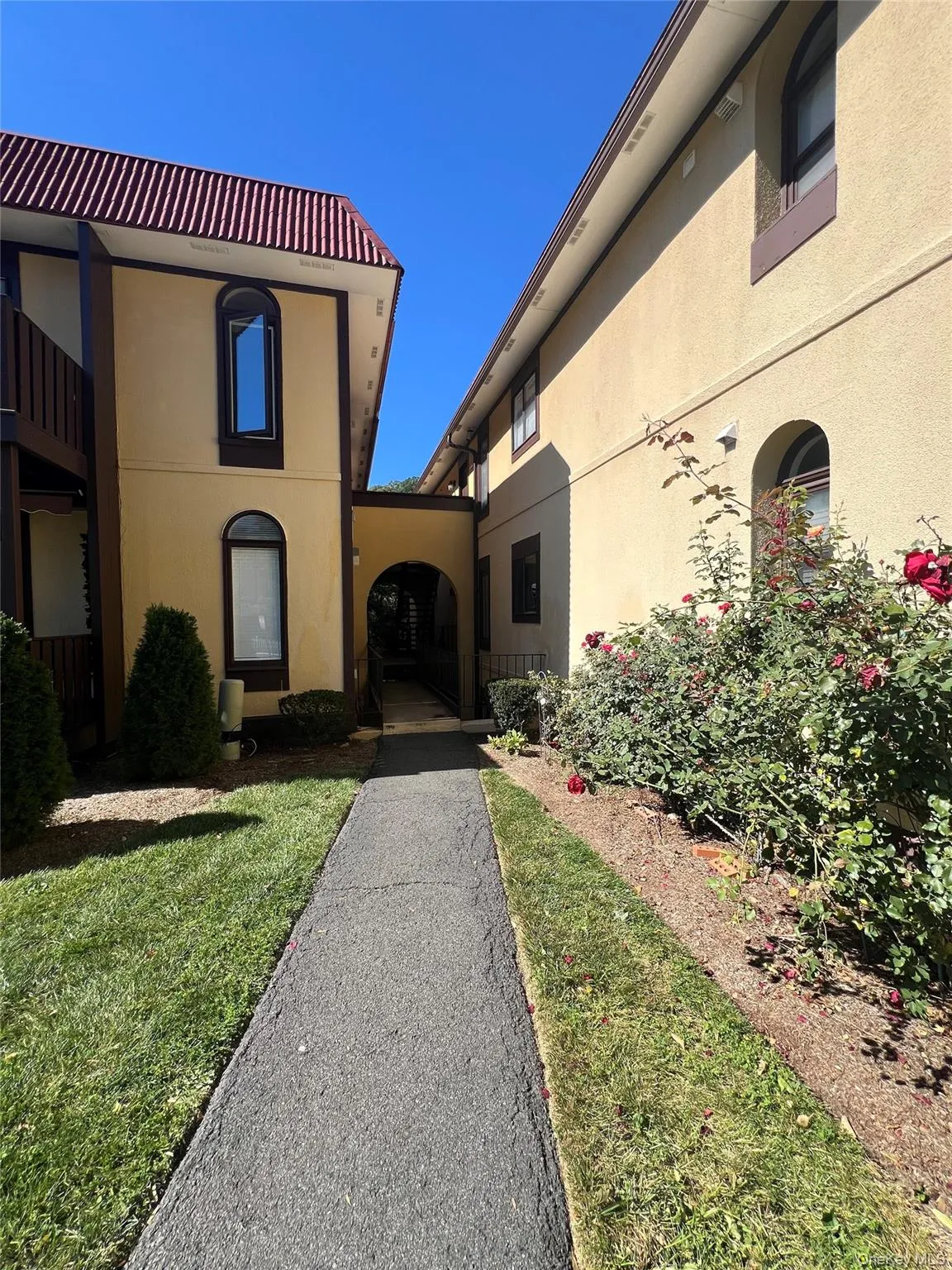 Walkway leading to units in Building 2 Walkway leading to units in Building 2