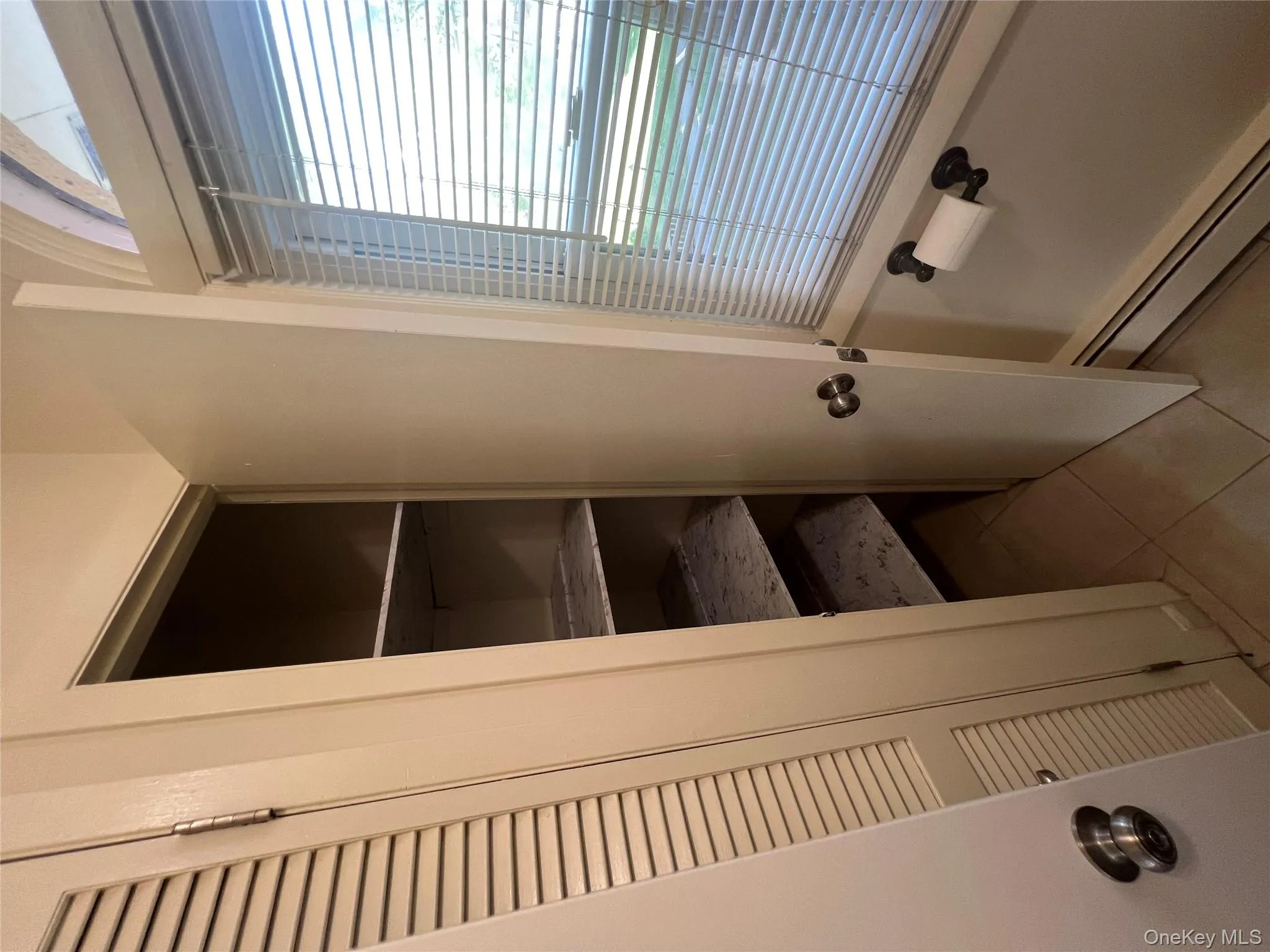 Closet with a baseboard radiator Closet with a baseboard radiator