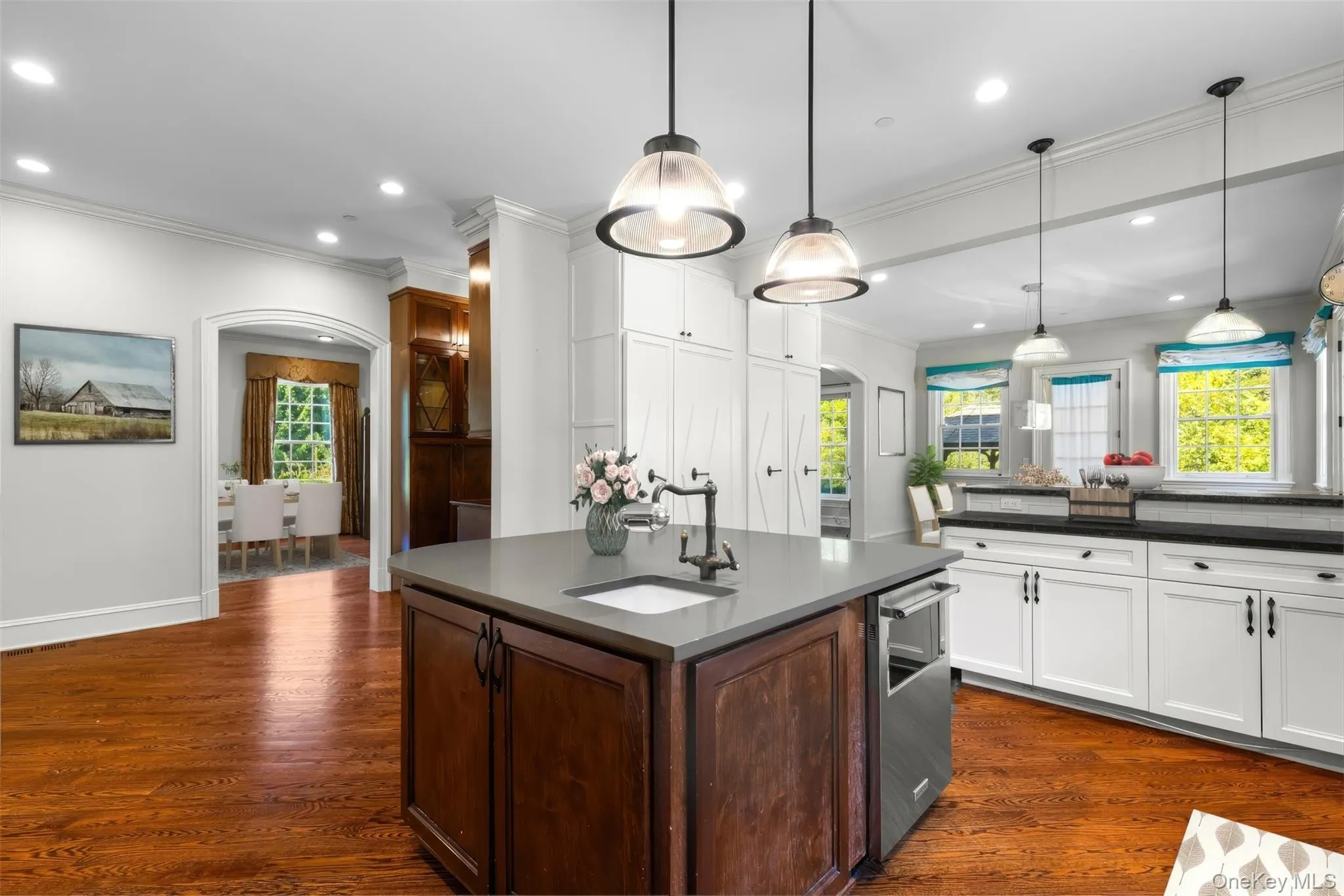 Kitchen with a view of the formal dining view. Virtually staged Kitchen with a view of the formal dining view. Virtually staged