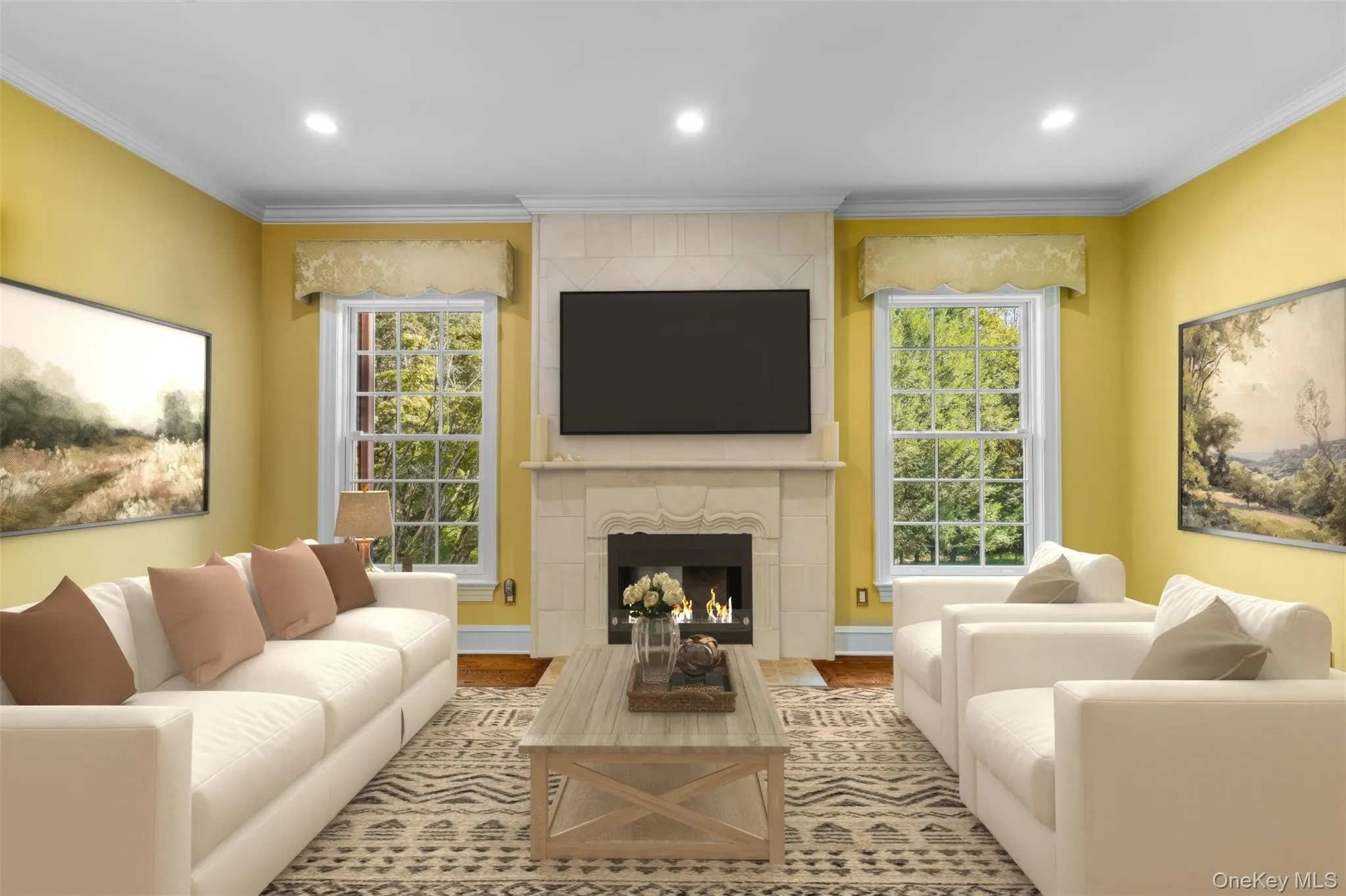 Formal living room with a fireplace is virtually staged Formal living room with a fireplace is virtually staged