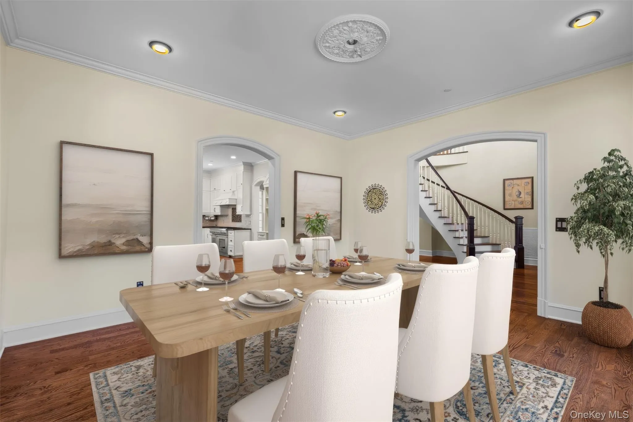 Formal dining room with a view of the kitchen is virtuallystaged Formal dining room with a view of the kitchen is virtuallystaged