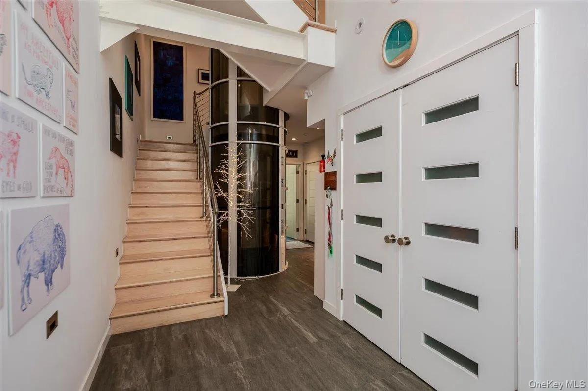 Hall featuring stairway Hall featuring stairway