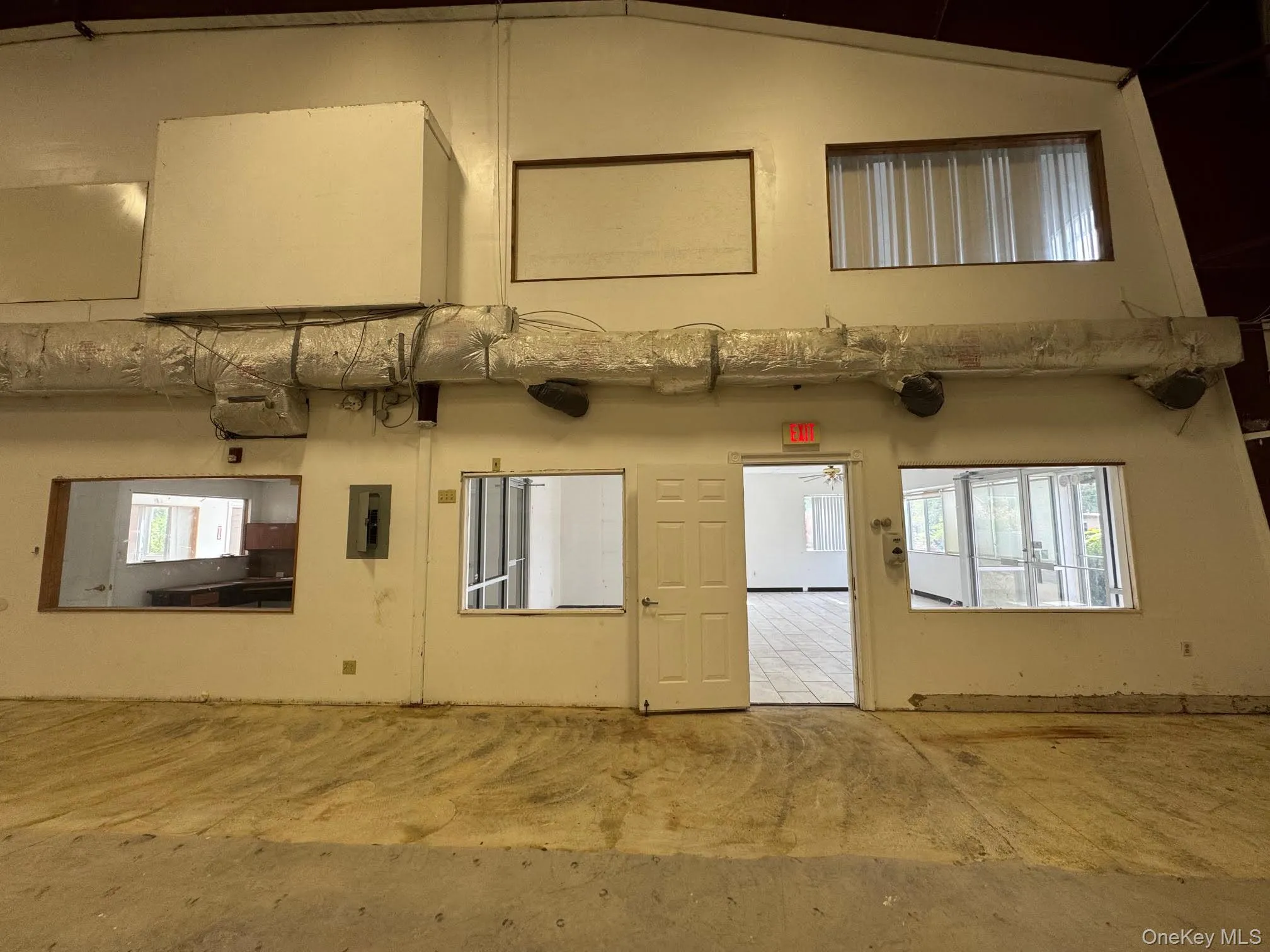 View from the workshop to the office and upstairs apartment... View from the workshop to the office and upstairs apartment...