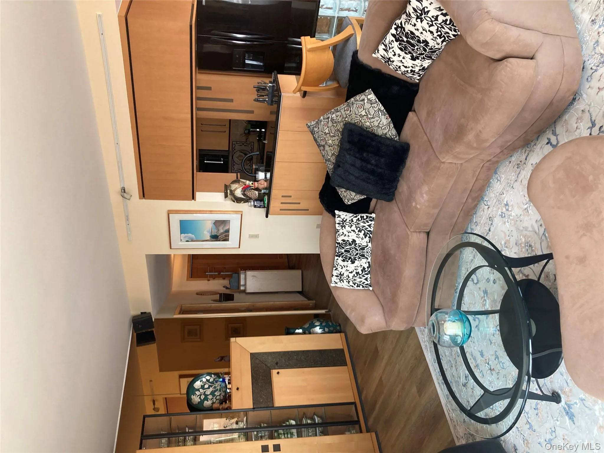 Living area with wood finished floors Living area with wood finished floors