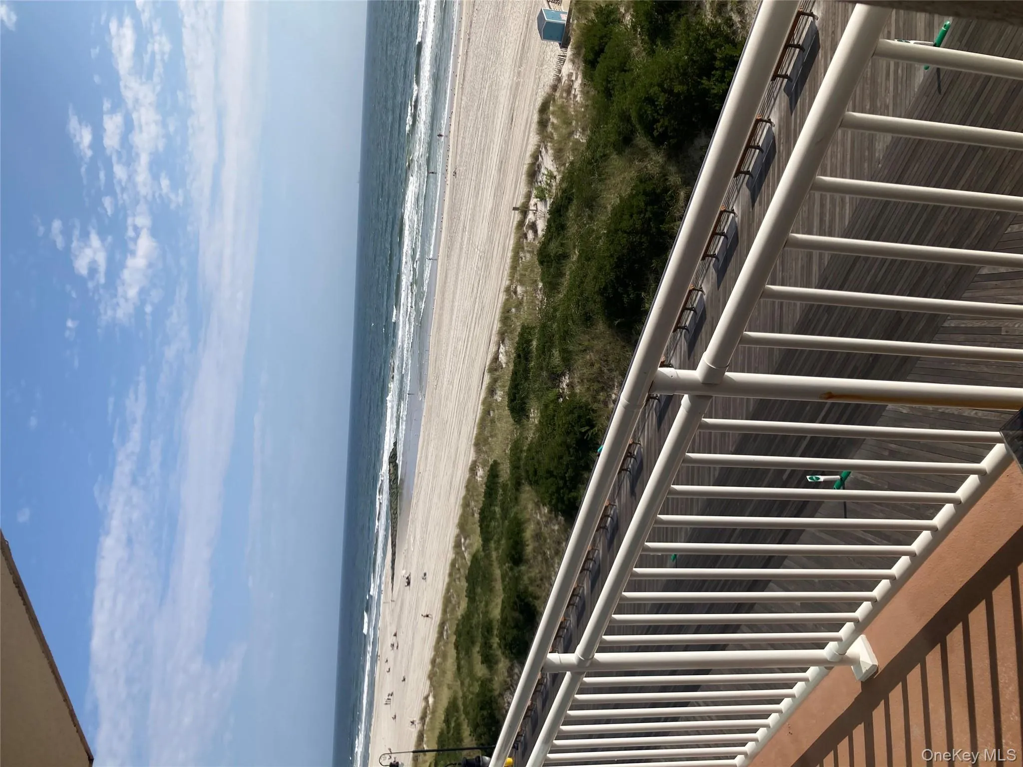 Water view featuring nearby beach Water view featuring nearby beach