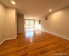 Recessed lighting, light hardwood flooring, and baseboard heating Recessed lighting, light hardwood flooring, and baseboard heating