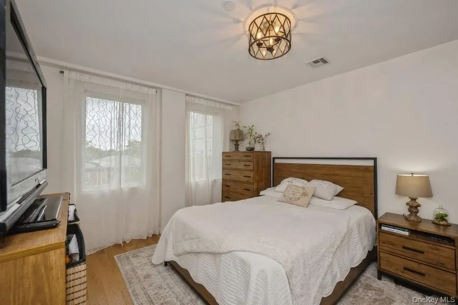 Bedroom with light wood-style floors Bedroom with light wood-style floors