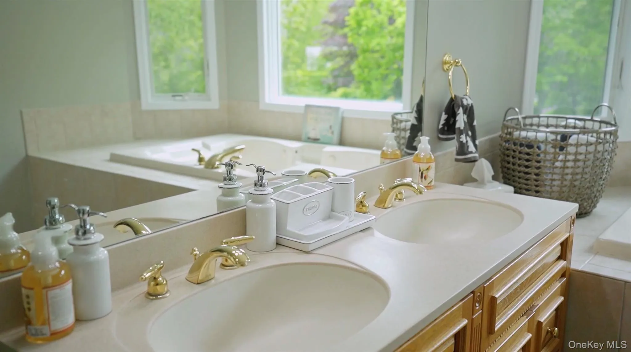 Full bath with double vanity and a garden tub Full bath with double vanity and a garden tub
