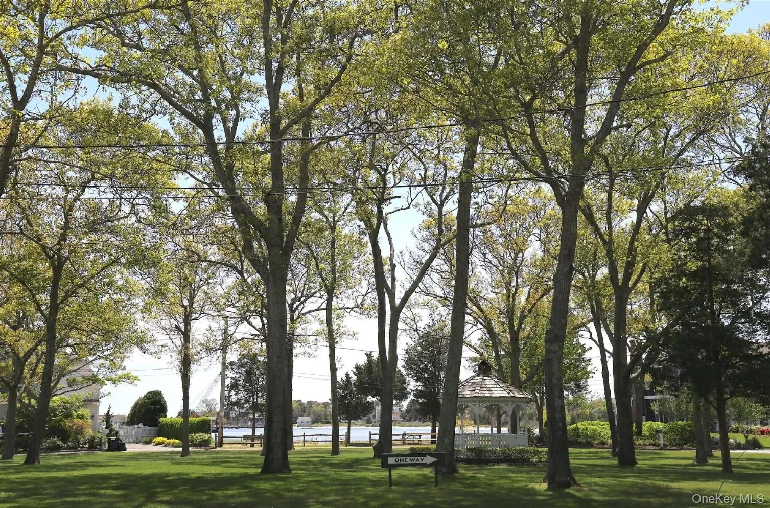 View of property's community with a lawn and a gazebo View of property's community with a lawn and a gazebo