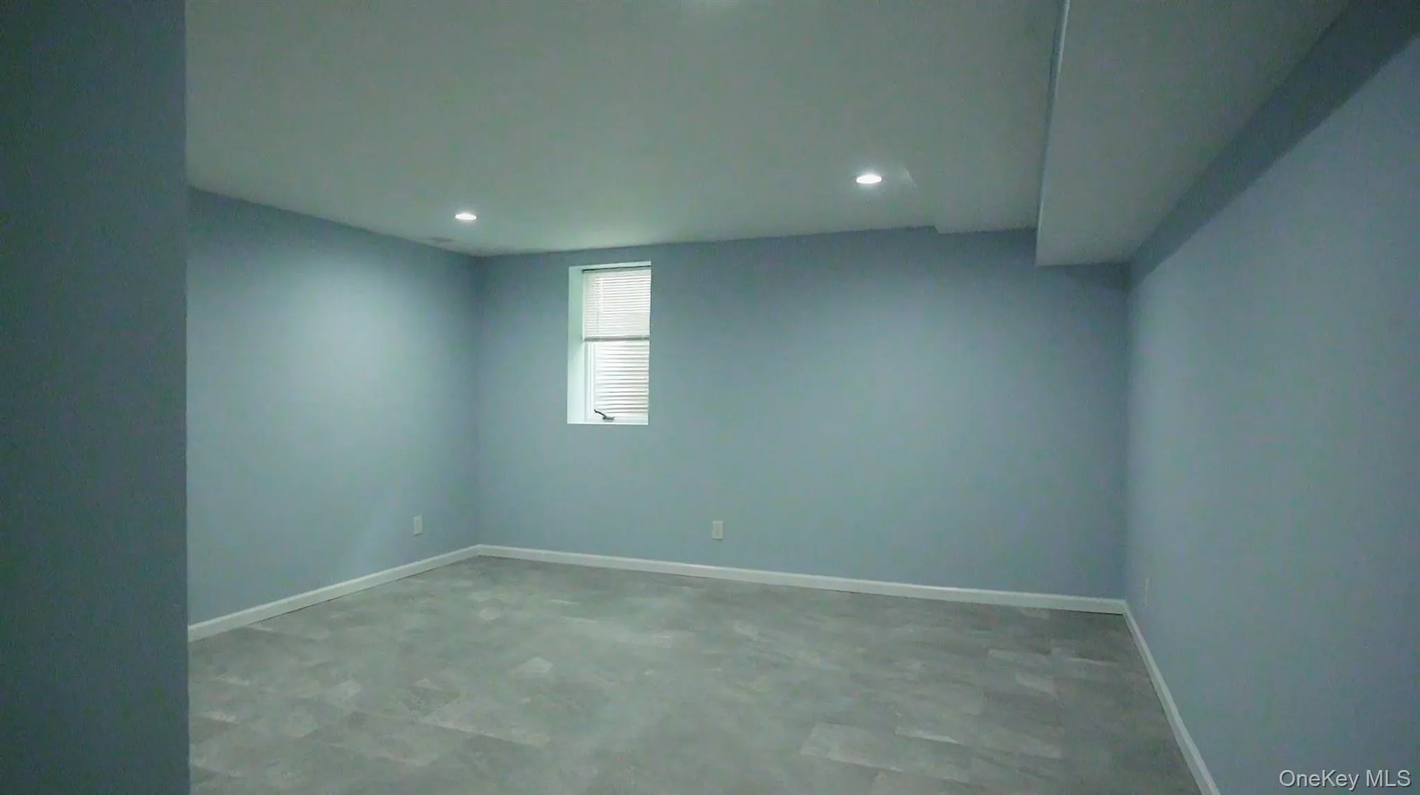 Empty room featuring recessed lighting and light floors Empty room featuring recessed lighting and light floors