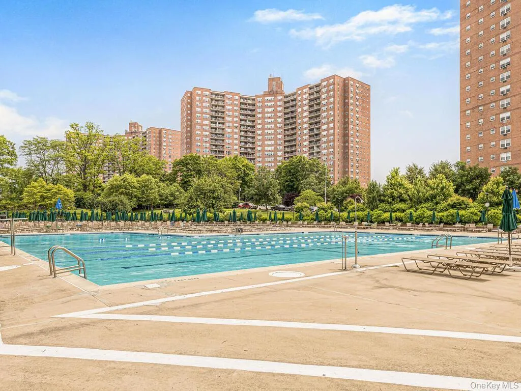 Community pool with a patio Community pool with a patio