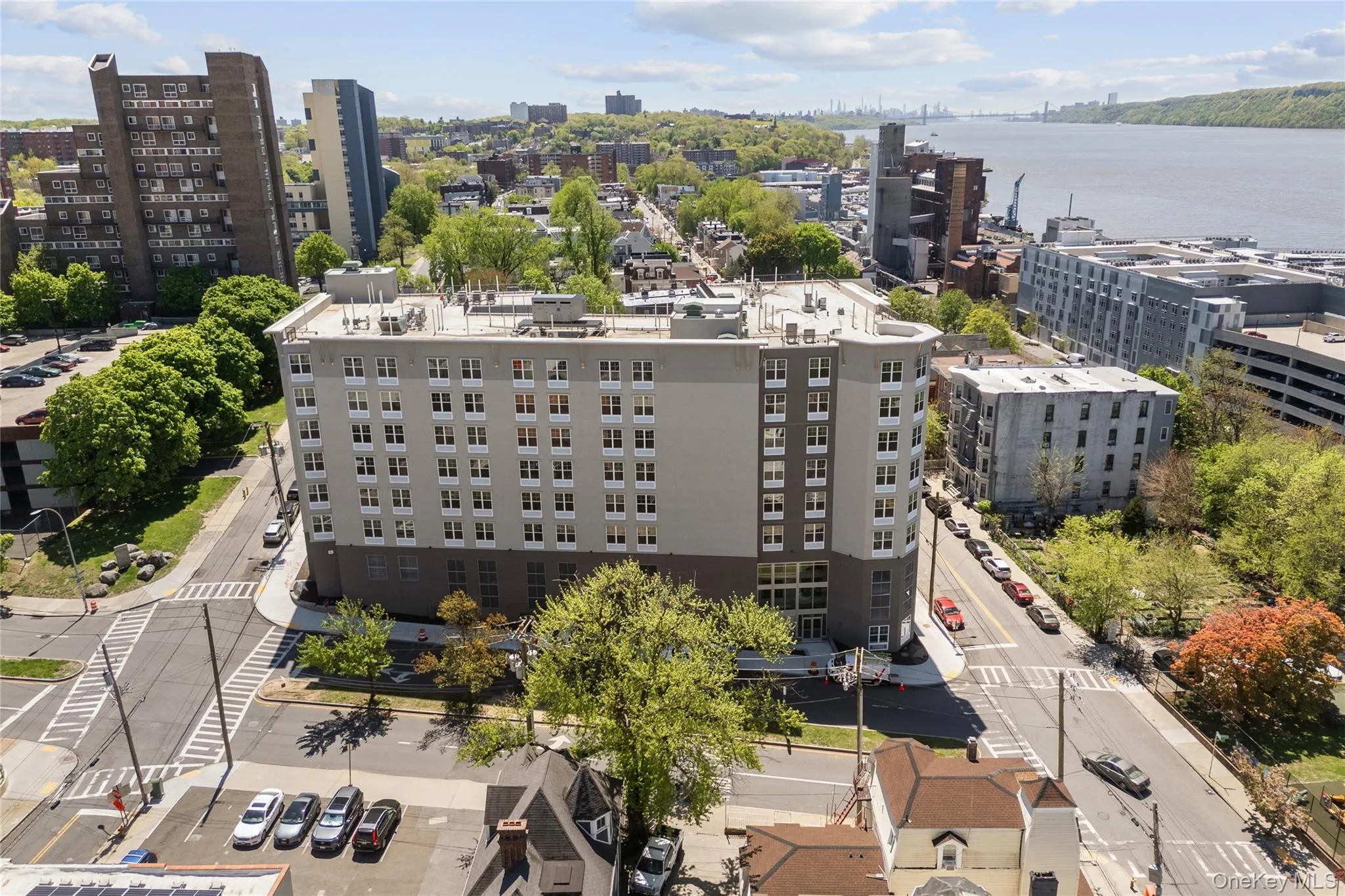 View of urban area with a large body of water View of urban area with a large body of water