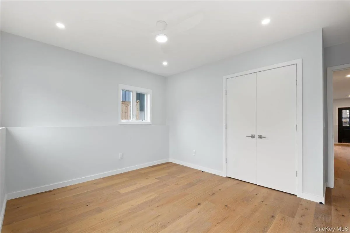 Unfurnished bedroom with light wood-style floors, a closet, recessed lighting, and a ceiling fan Unfurnished bedroom with light wood-style floors, a closet, recessed lighting, and a ceiling fan