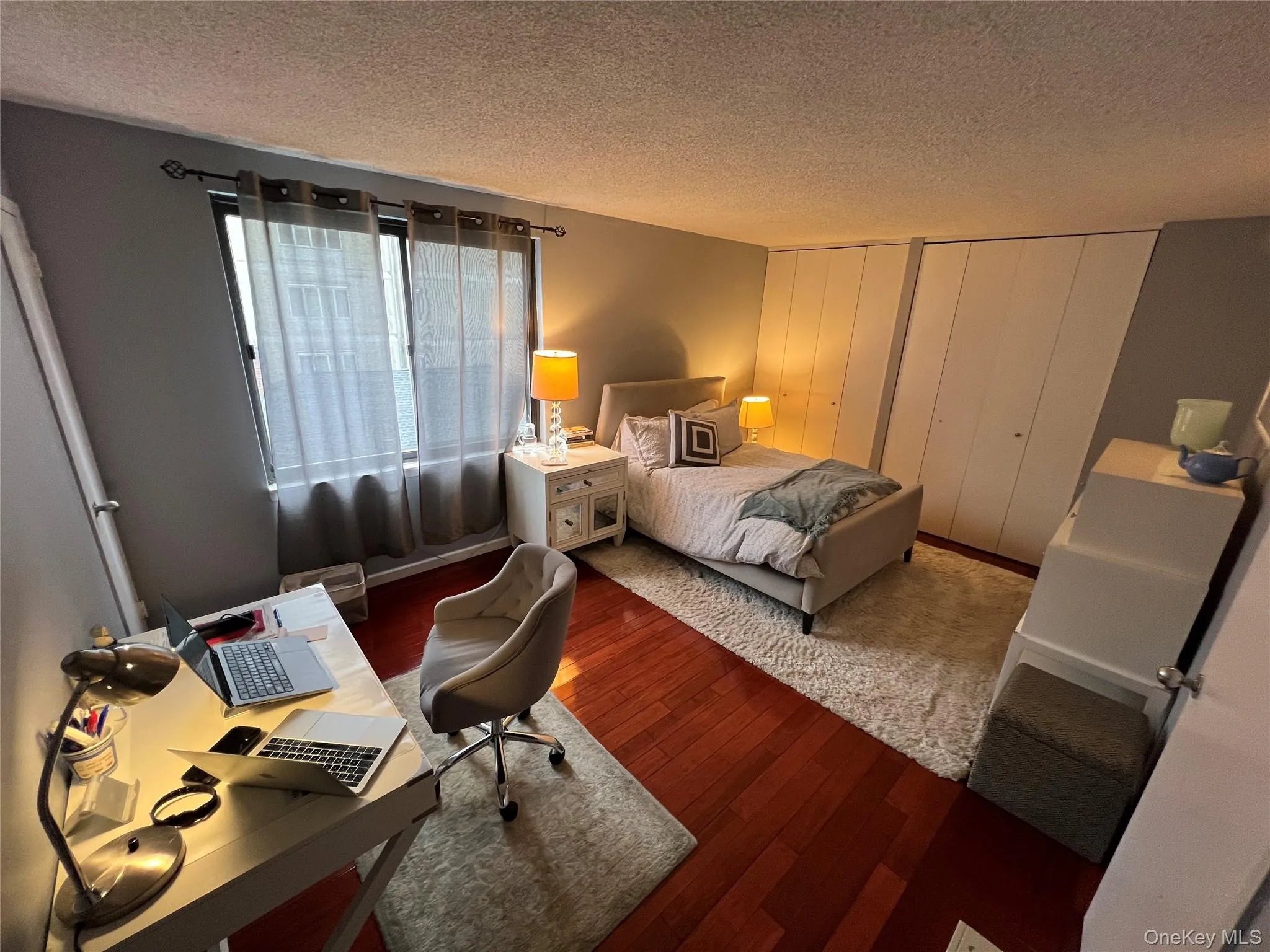 Bedroom with wood finished floors Bedroom with wood finished floors