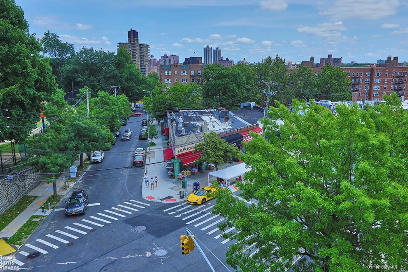 View of urban area with a tree filled landscape View of urban area with a tree filled landscape