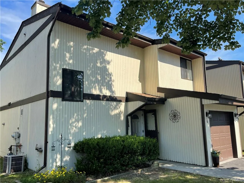 View of property featuring central AC View of property featuring central AC