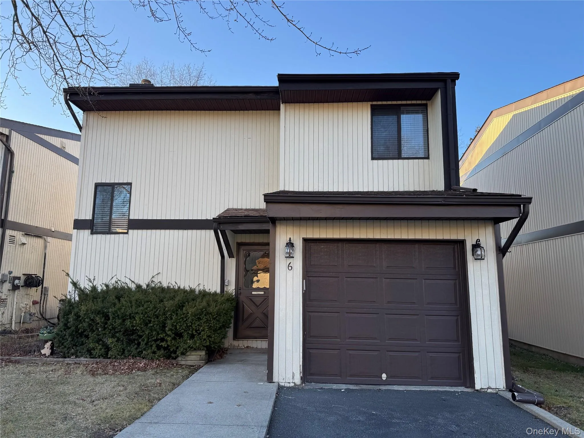 View of front of home featuring a garage View of front of home featuring a garage